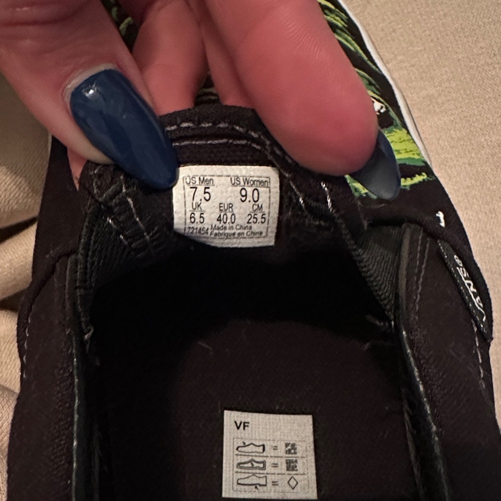 Vans Black Slip-Ons with Green Eye Pattern - Picture 3 of 3
